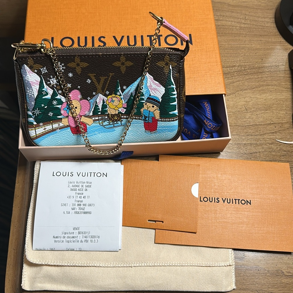 Louis Vuitton Brown and Pink Clutch Festive Design
BRAND NEW